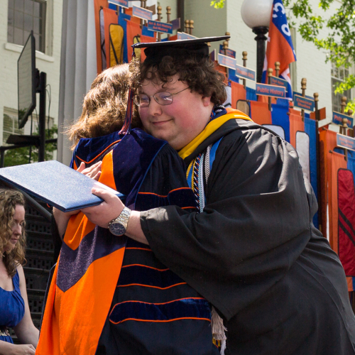 Jamie Welch crossing the stage at Commencement.